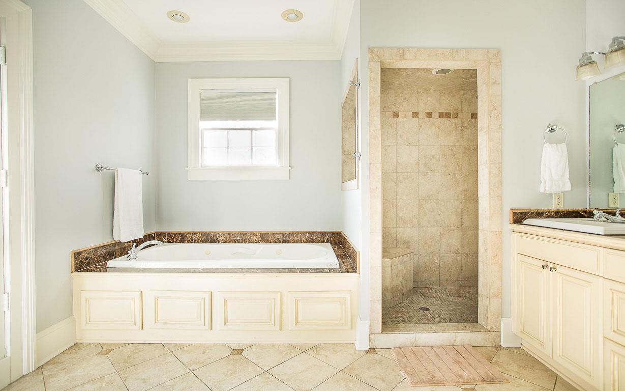 The primary bath has a large soaking tub and walkin shower.