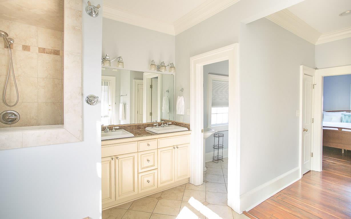 The water closet is private from the bath.