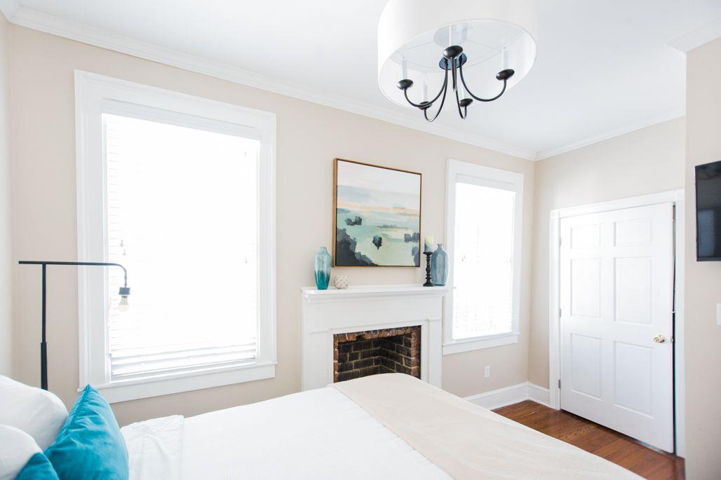 Located on the first floor, you will find the first bedroom fit with a queensize bed.