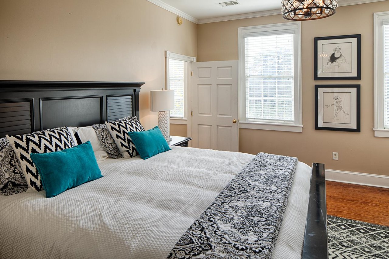 This bedroom features a King size bed.