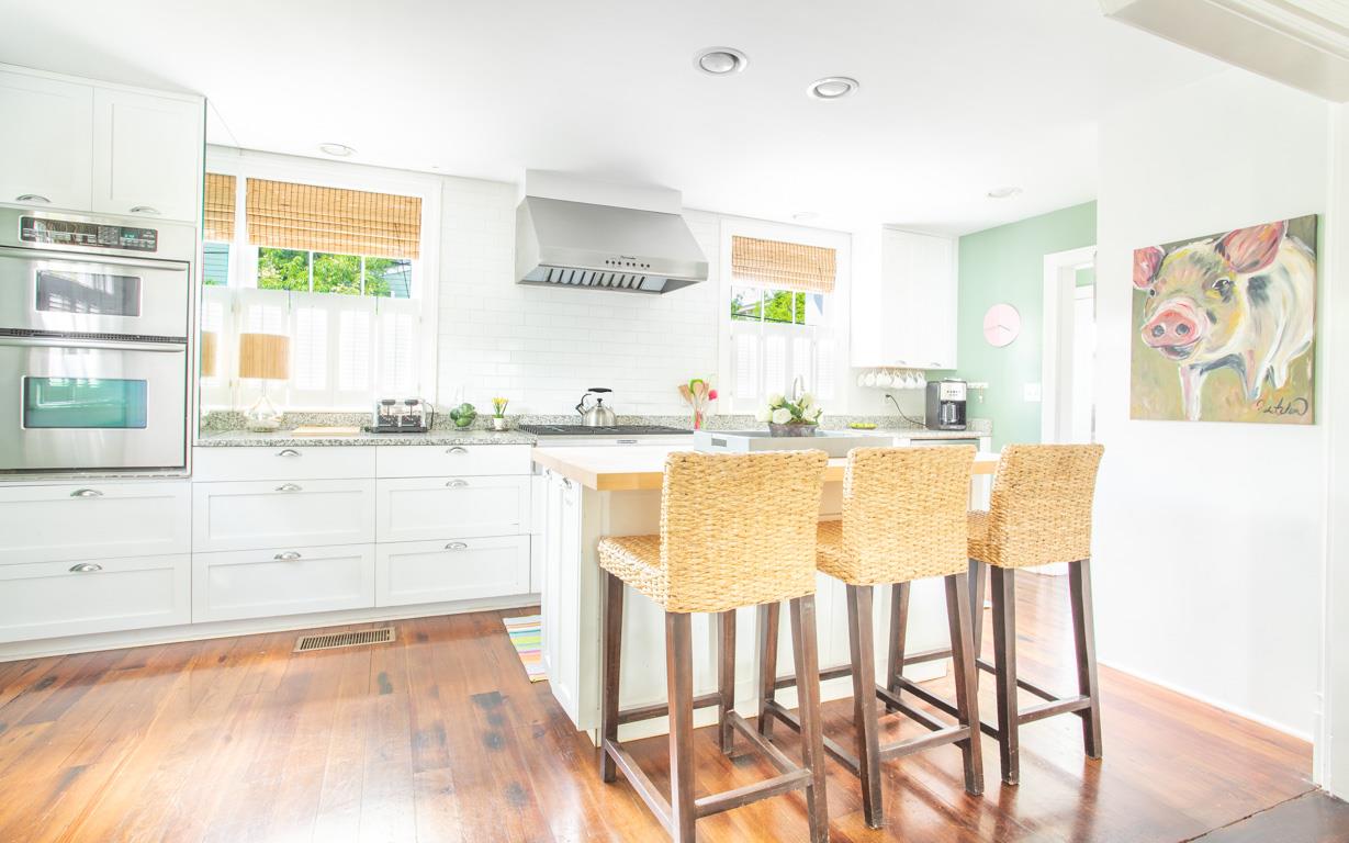 Stainless appliances, granite counters and an oversized butcher block island.