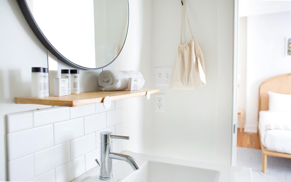 Towels, soap, and a hair dryer are provided.