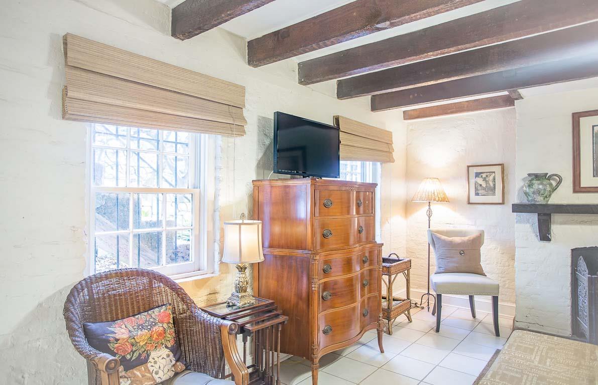 Antique armoire allows you to unpack and feel at home.