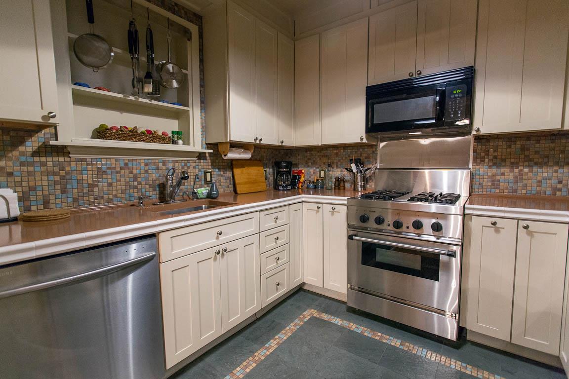 Stainless steel appliances and a gas range make cooking a breeze.