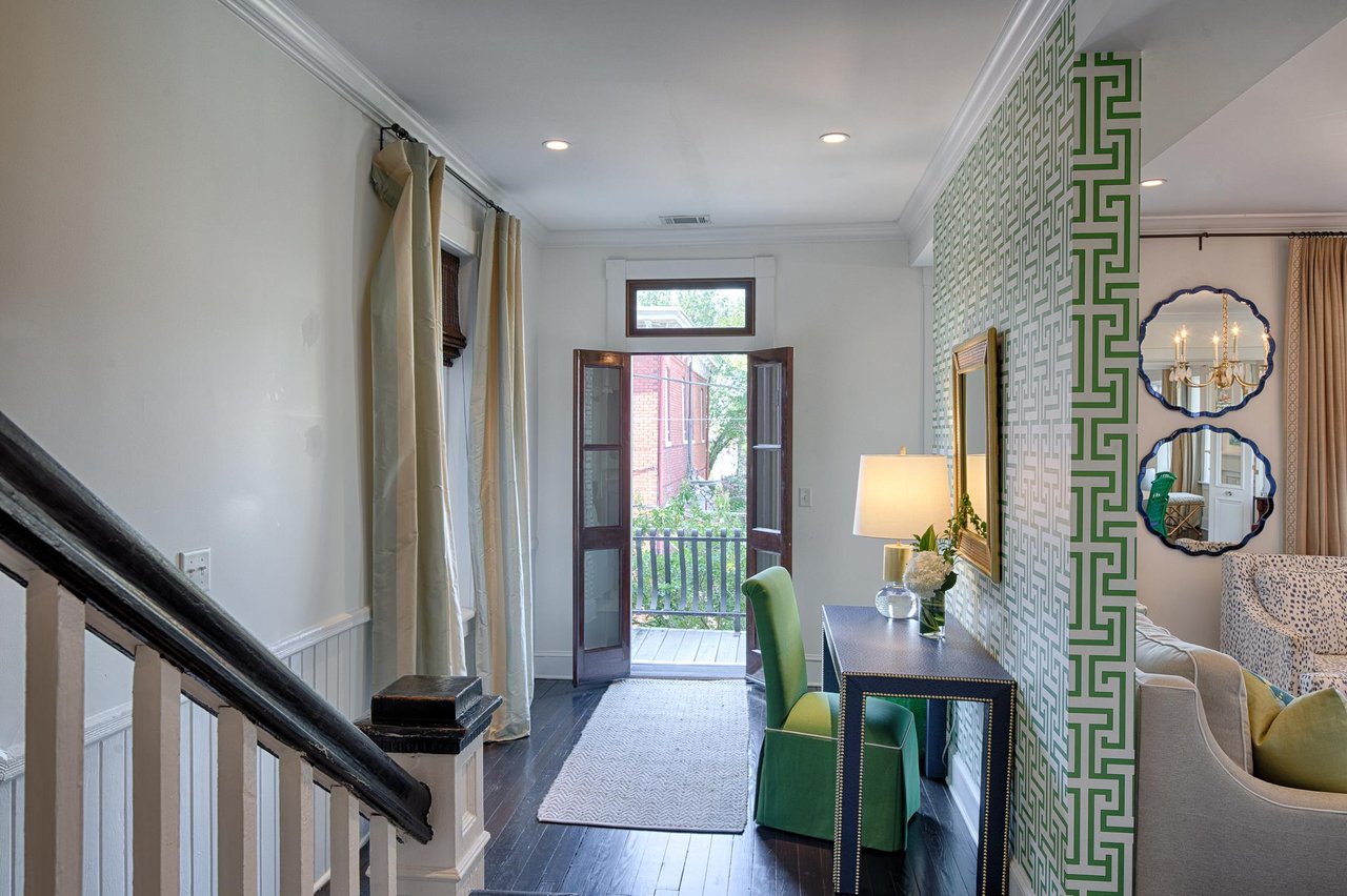 Each floor features a charming balcony that overlooks Charlton Street