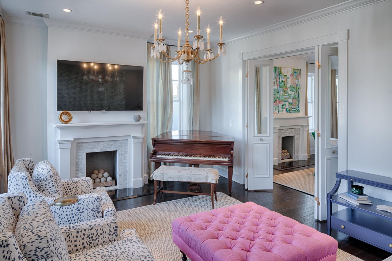 Just beyond the folding glass doors, youll find the formal dining space.
