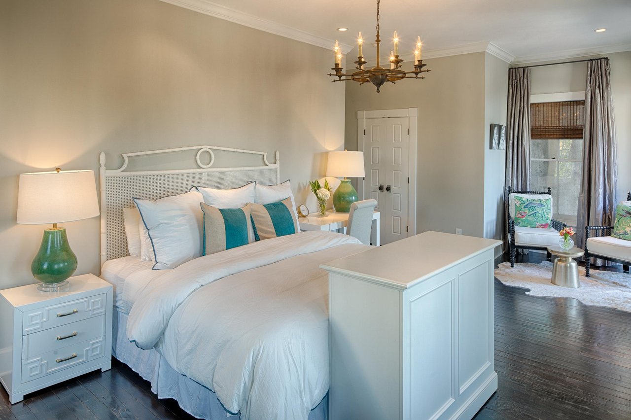 Boasting with high ceilings, custom furnishings, a plush king size bed, and so much more.