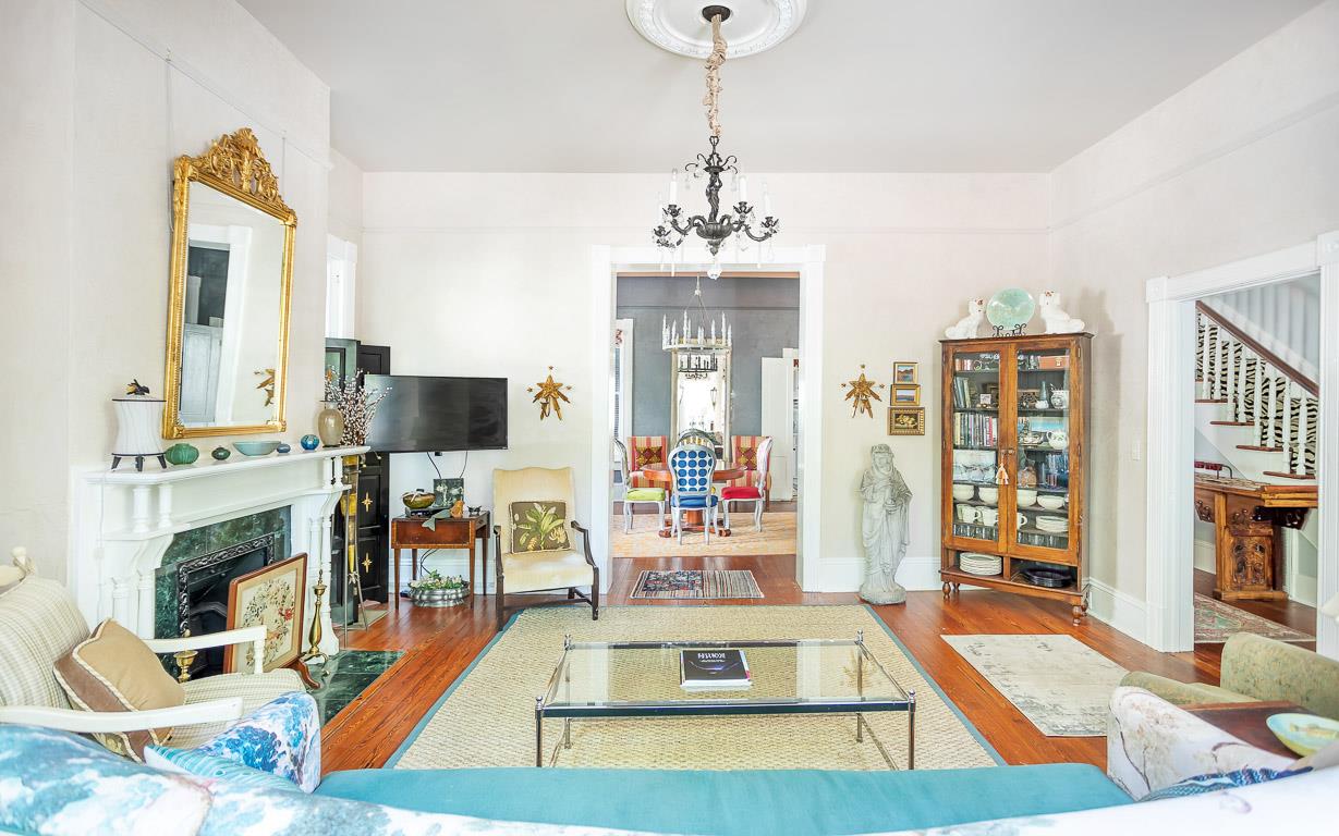 Just off of the parlor, you will head into the formal dining room.