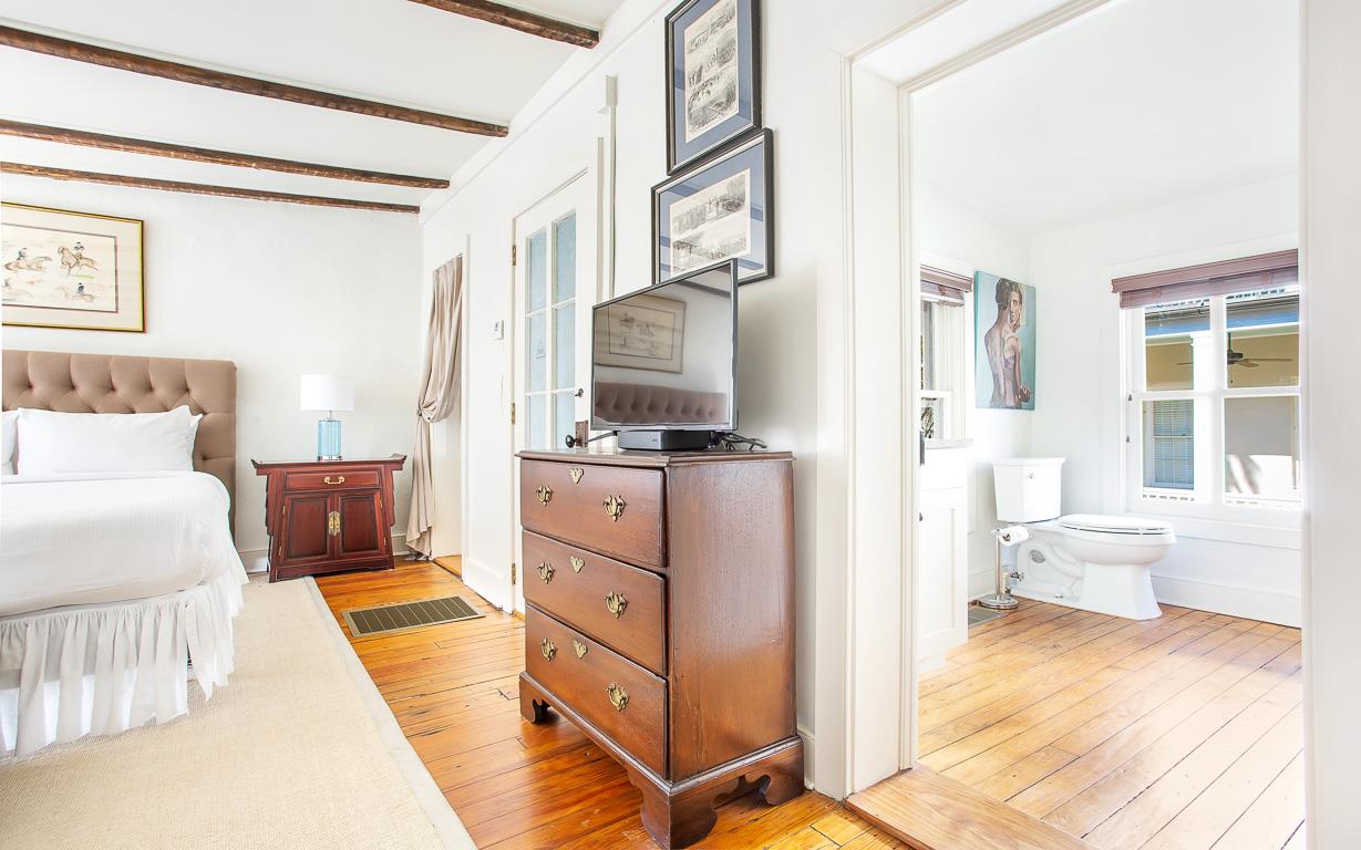 A full bathroom is located right off of the kitchen.