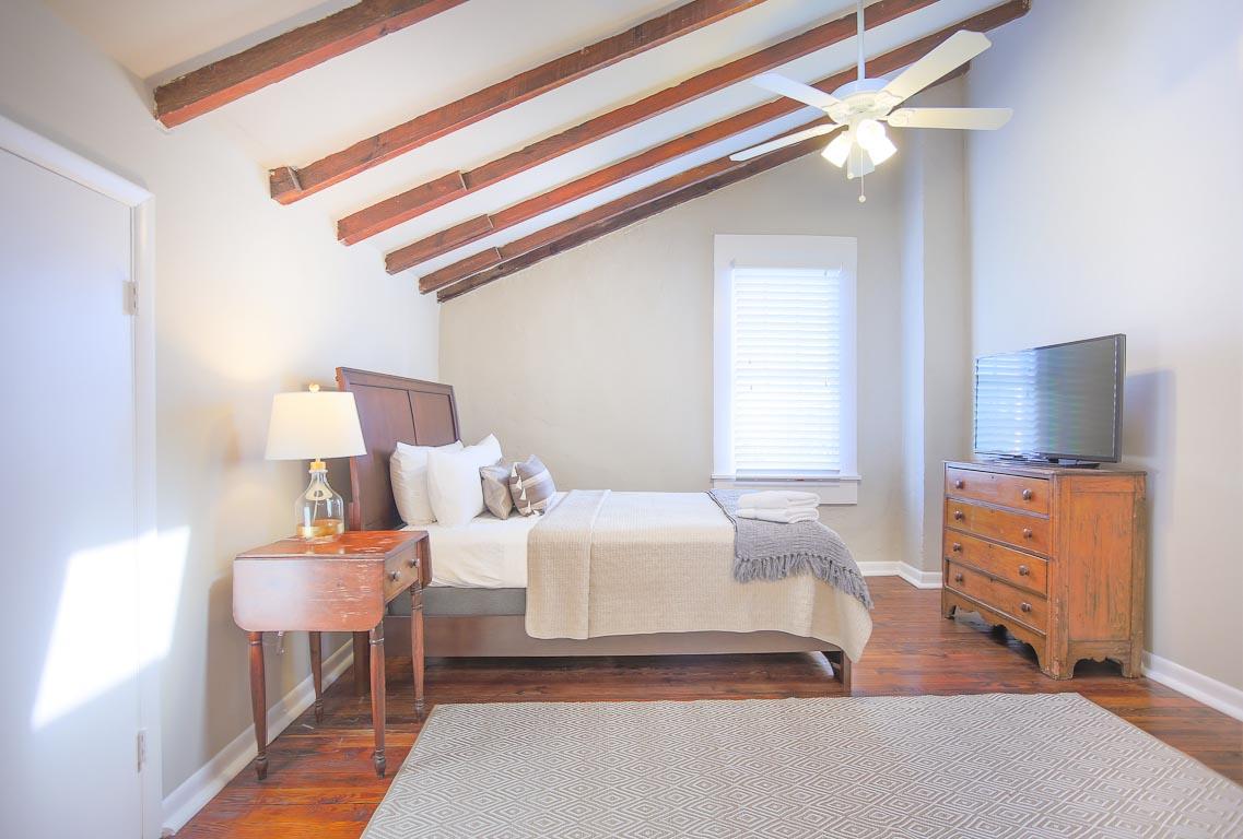 The large flat screen TV in the living space.