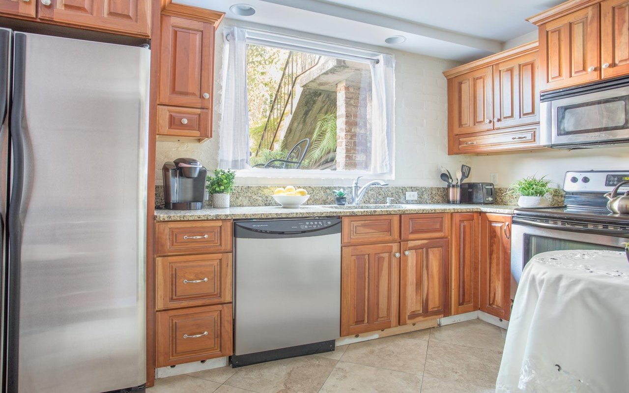 The bright and sunny kitchen is equipped with everything you39d need.