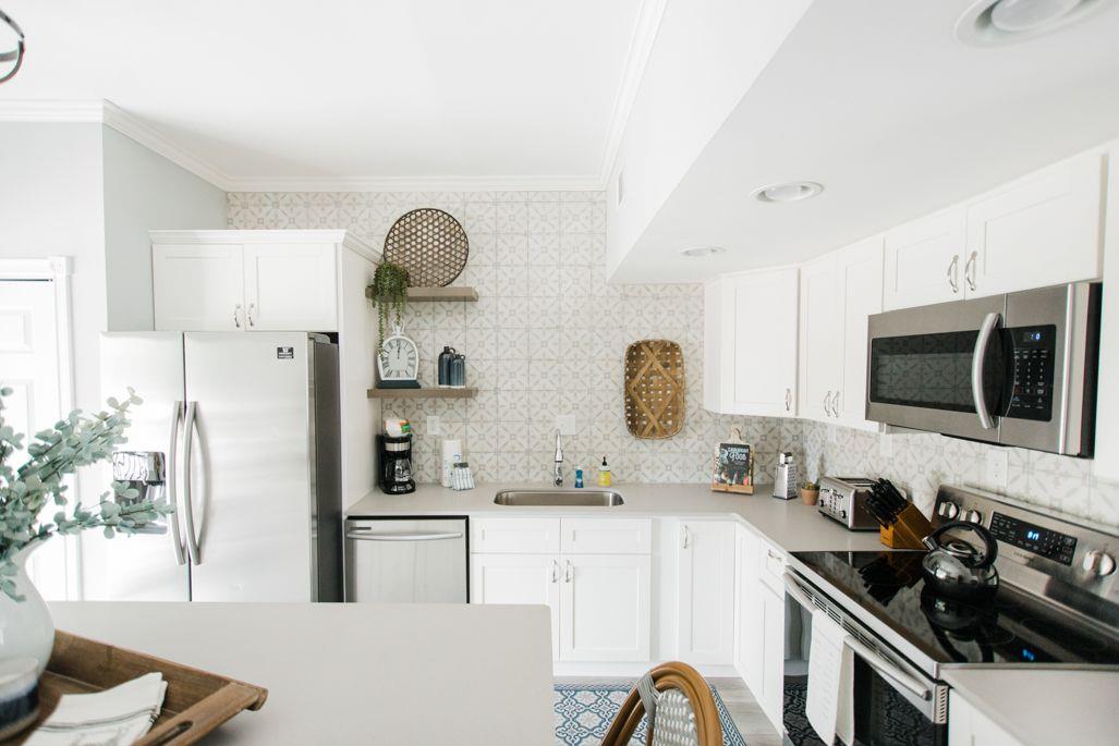Stainless steel appliances tie this kitchen together.
