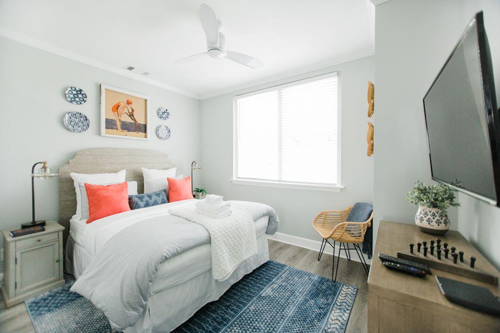 This bedroom offers a queensize bed.