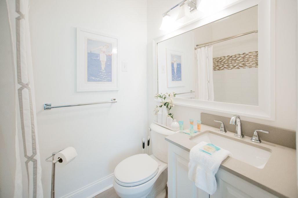 Just off of the second bedroom, you can find an ensuite bathroom.