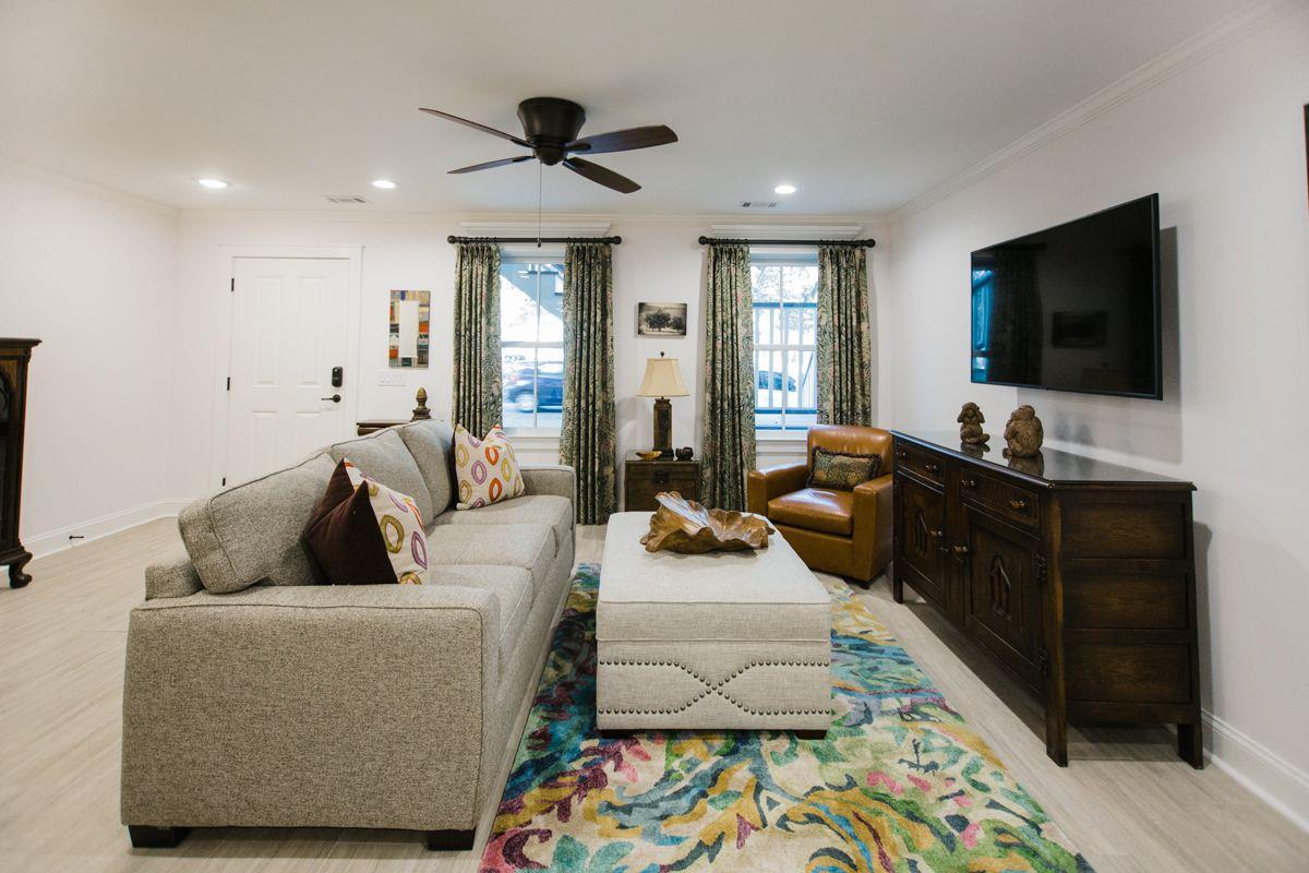 The main living space downstairs offers fine furnishings similar to upstairs.