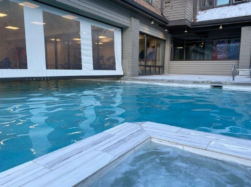 Outdoor hot tub. Swim in and out heated pool also with indoor hot tub