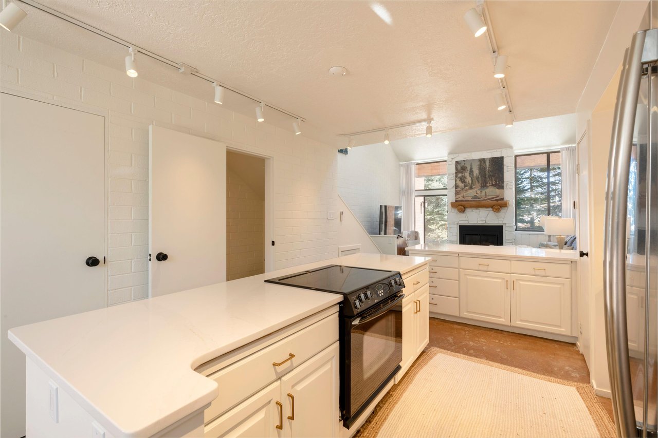 Warm, Open Kitchen Stocked with Cookware, Bakeware, Drinkware  Utensils