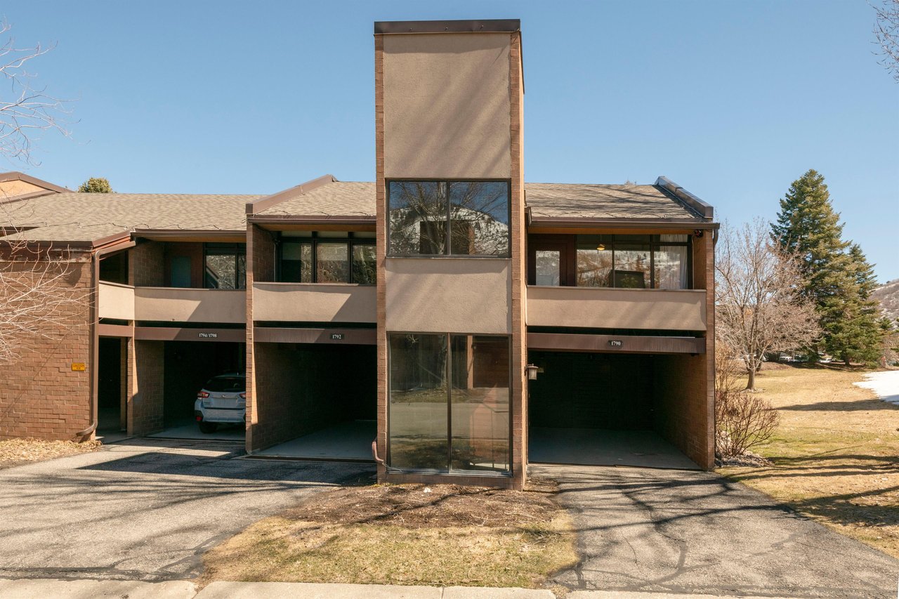 Parking for 2 vehicles – One Covered, One Open for YearRound Convenience