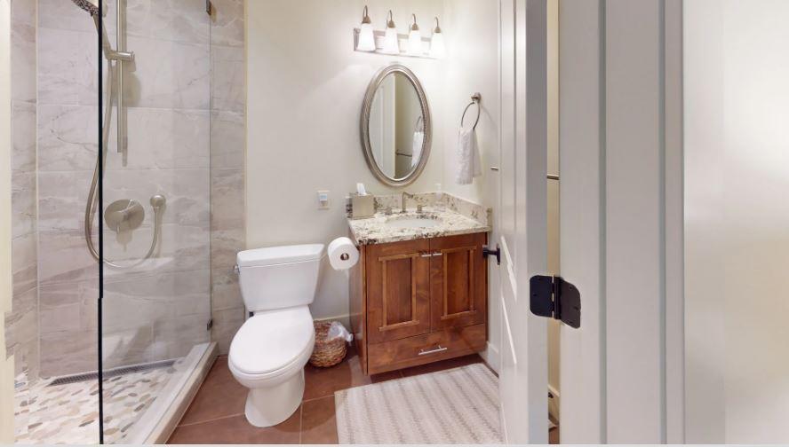 Master bedrooms ensuite bathroom with shower and vanity