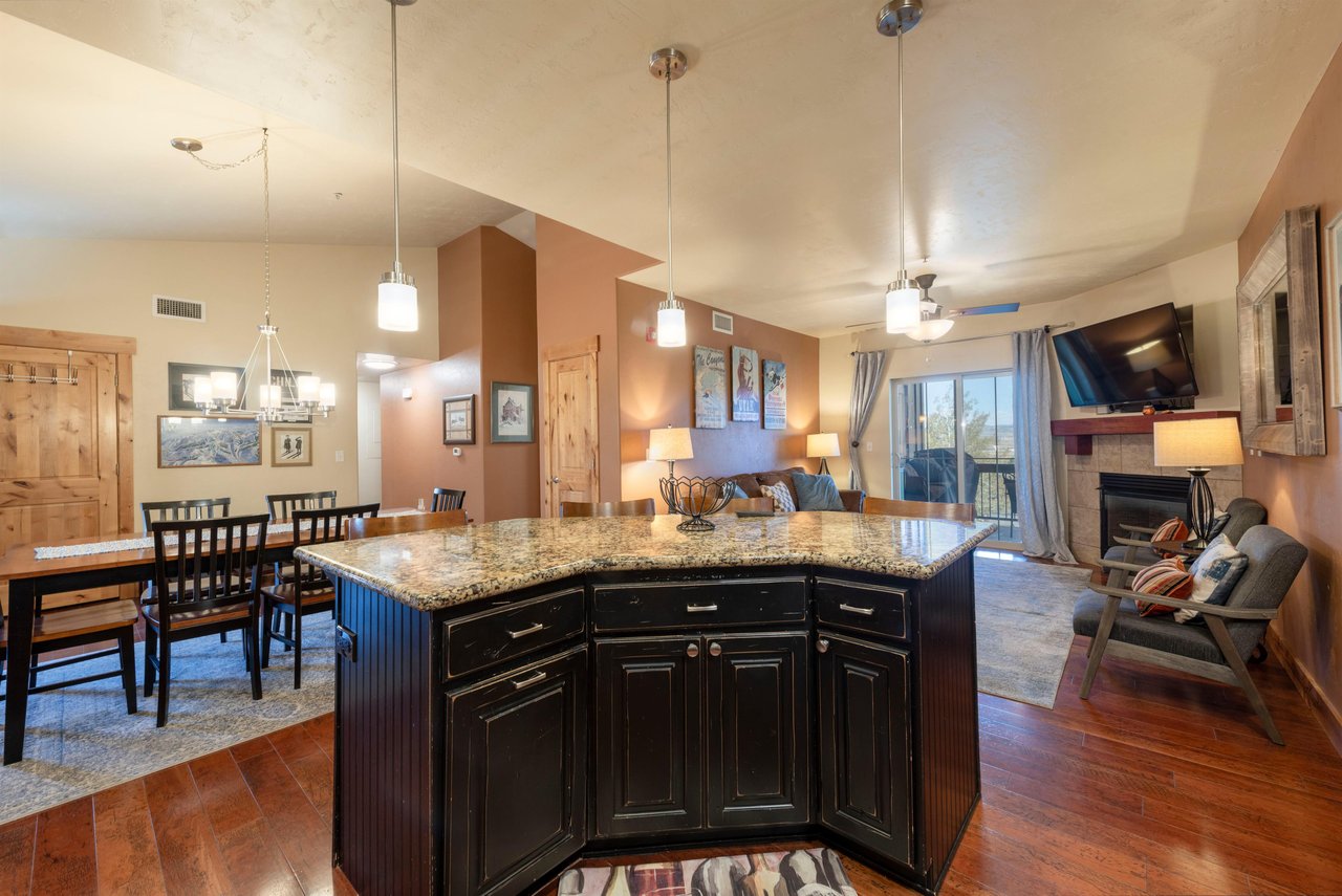 Wellequipped kitchen with ample counter space and inviting dining area.