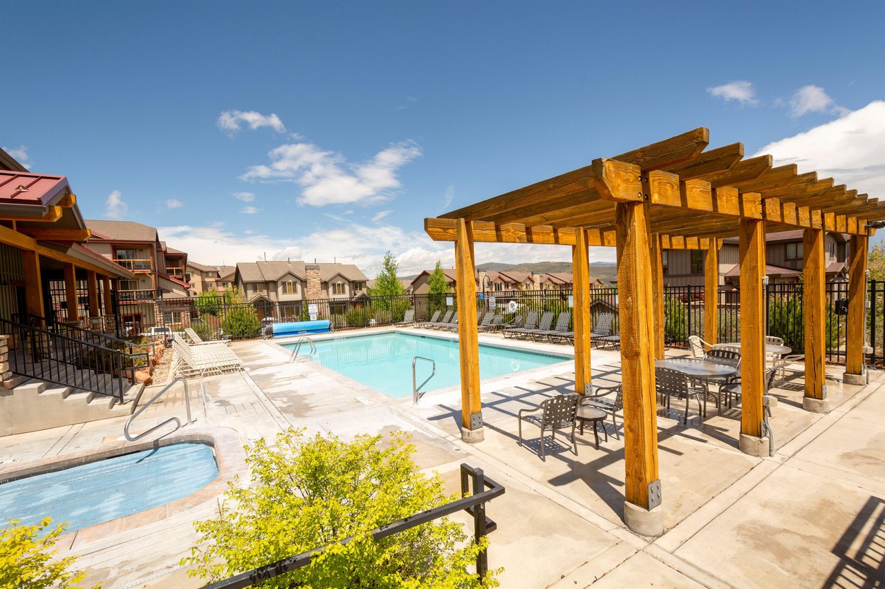 Community seasonal summer  fall pool year round hot tub.