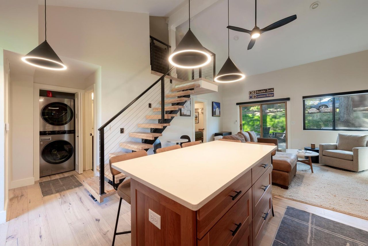 Kitchen seating for 5 plus 2 additional via dining nook under the stairs.