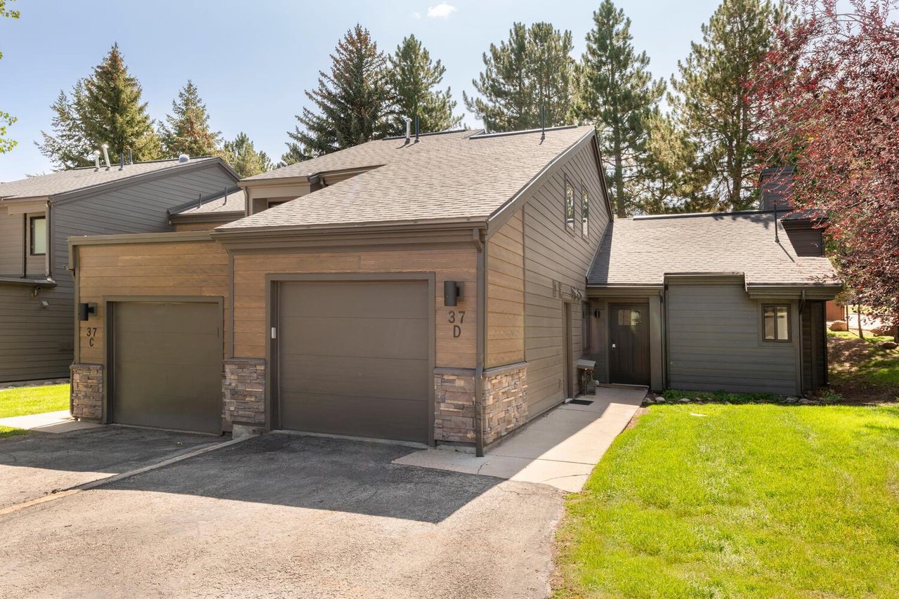 Attached garage for one vehicle second vehicle parks on the driveway.