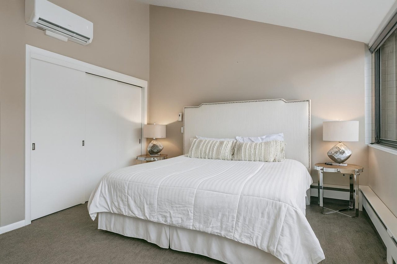 Contemporary bedroom featuring king bed