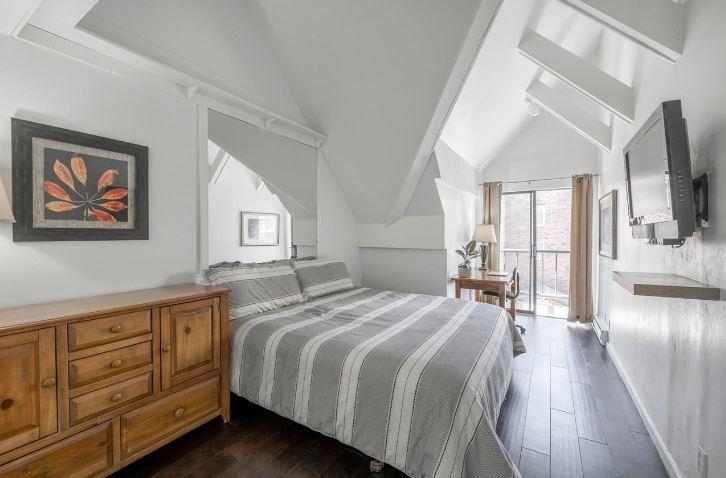 Restful nights await in the bright, airy master bedroom at Lodge at Mountain Village 303 — your skiinskiout retreat at Park City Resort.