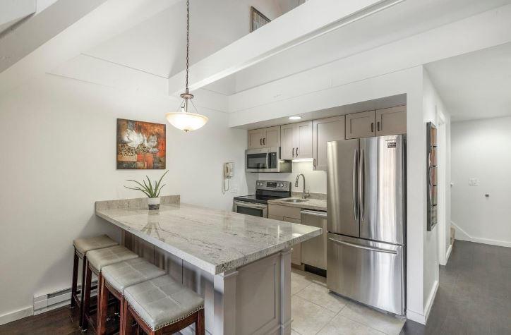 Cook, gather, and unwind in the fully equipped kitchen at Lodge at Mountain Village 303 — skiinskiout comfort at Park City Resort.