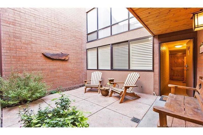 Relax and stargaze from the private atrium at Park Avenue 211 — tucked between three walls, its your own peaceful outdoor escape.