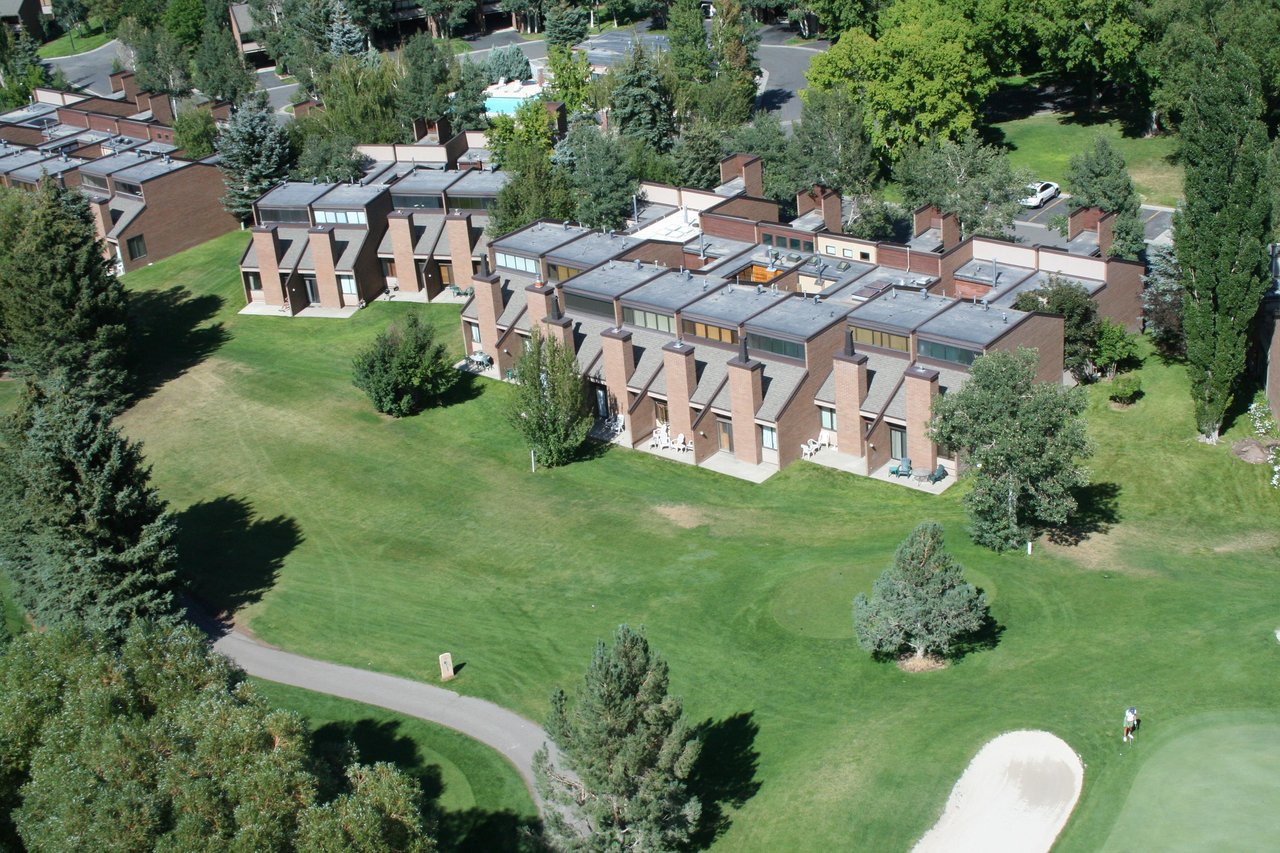 An aerial view of Park Avenue 243 showcases its prime location along the lush golf course fairways, making it one of the most soughtafter Park City condo rentals in the heart of the mountains.