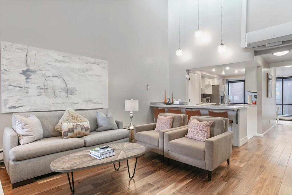 Sophisticated style meets mountain comfort at Park Avenue 296. The bright and airy living space flows seamlessly into the kitchen, creating an open and elegant atmosphere that makes this Park City vac