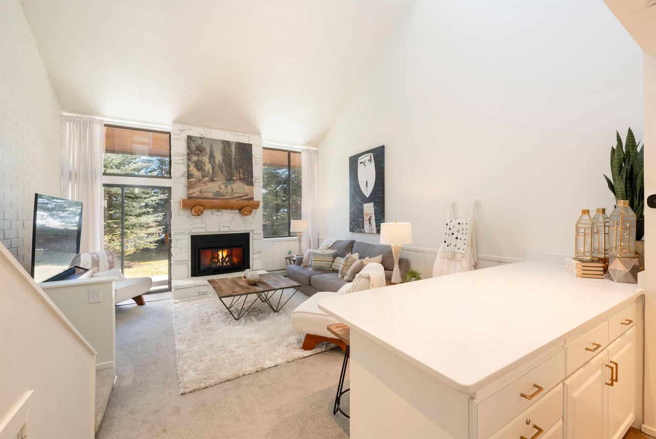 Vaulted ceilings, a crackling fireplace, and lush treelined views create an atmosphere of pure mountain serenity at Park Avenue 299. This is Park City lodging at its most peaceful and inviting.
