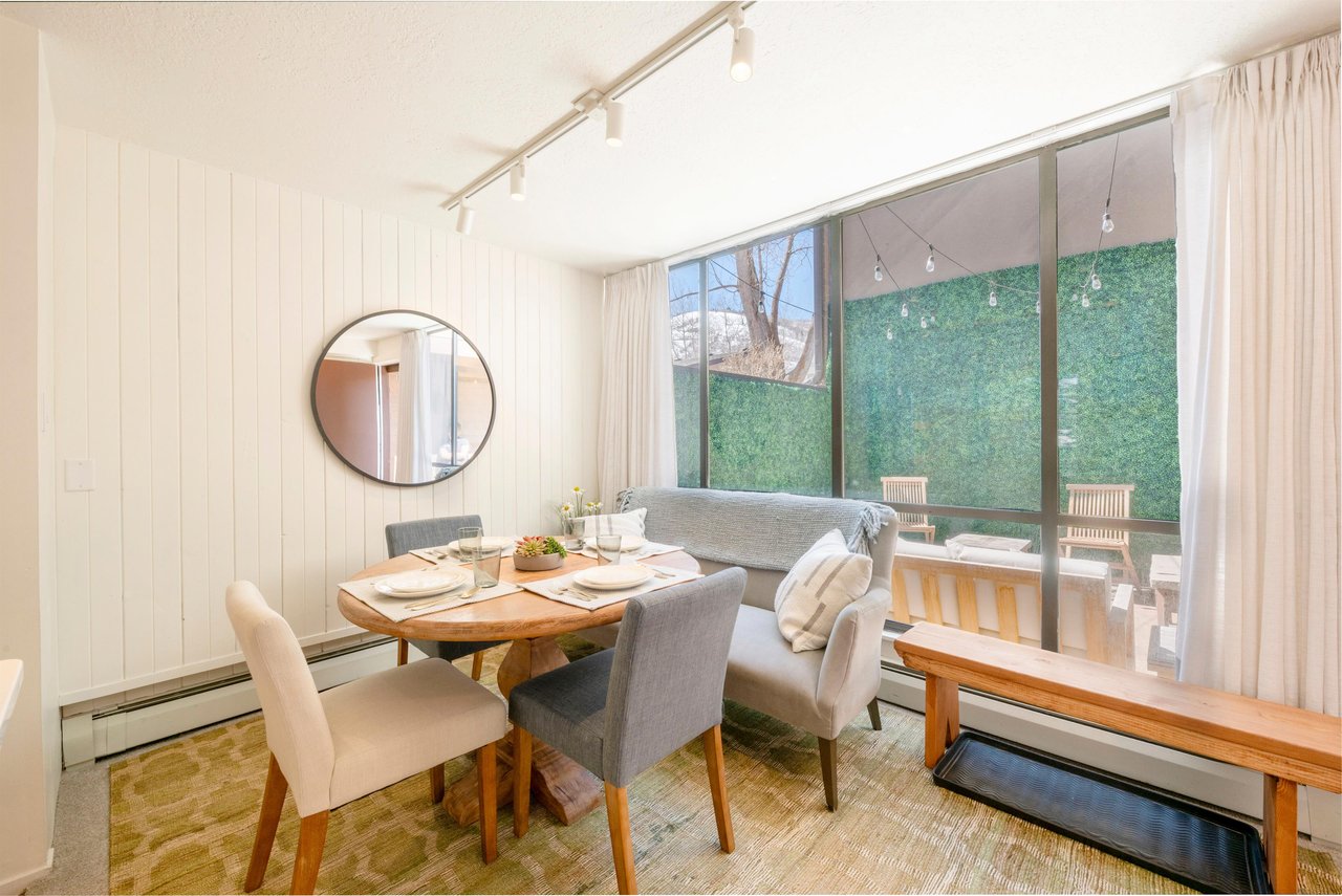 Bright, airy, and effortlessly charming — the dining and lounge area at Park Avenue 299 is where relaxation meets style. Floortoceiling windows and natural finishes make this Park City vacation rent
