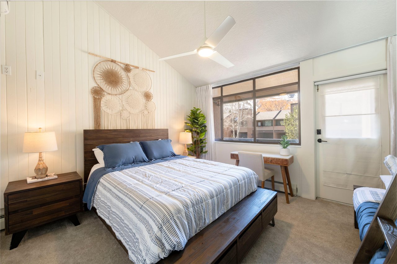 Rest, recharge, and rise ready for adventure in this inviting queen bedroom at Park Avenue 299. With thoughtful décor and a sunny workspace, this Park City vacation rental is designed for guests who w