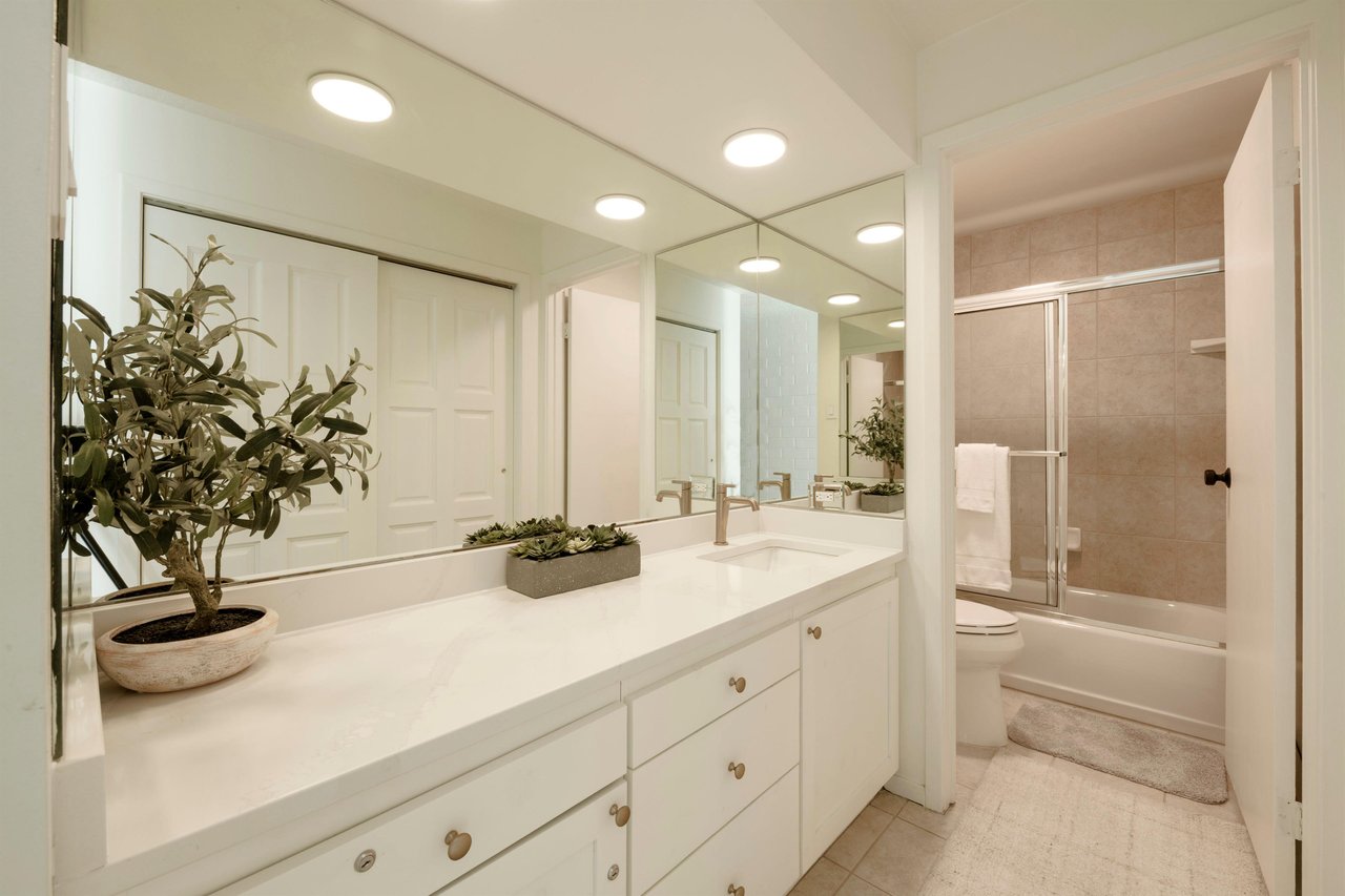 The full bathroom at Park Avenue 299 impresses with its generous vanity, crisp white finishes, and tubshower combo. Thoughtful details like these are what make this Park City condo rental a standout