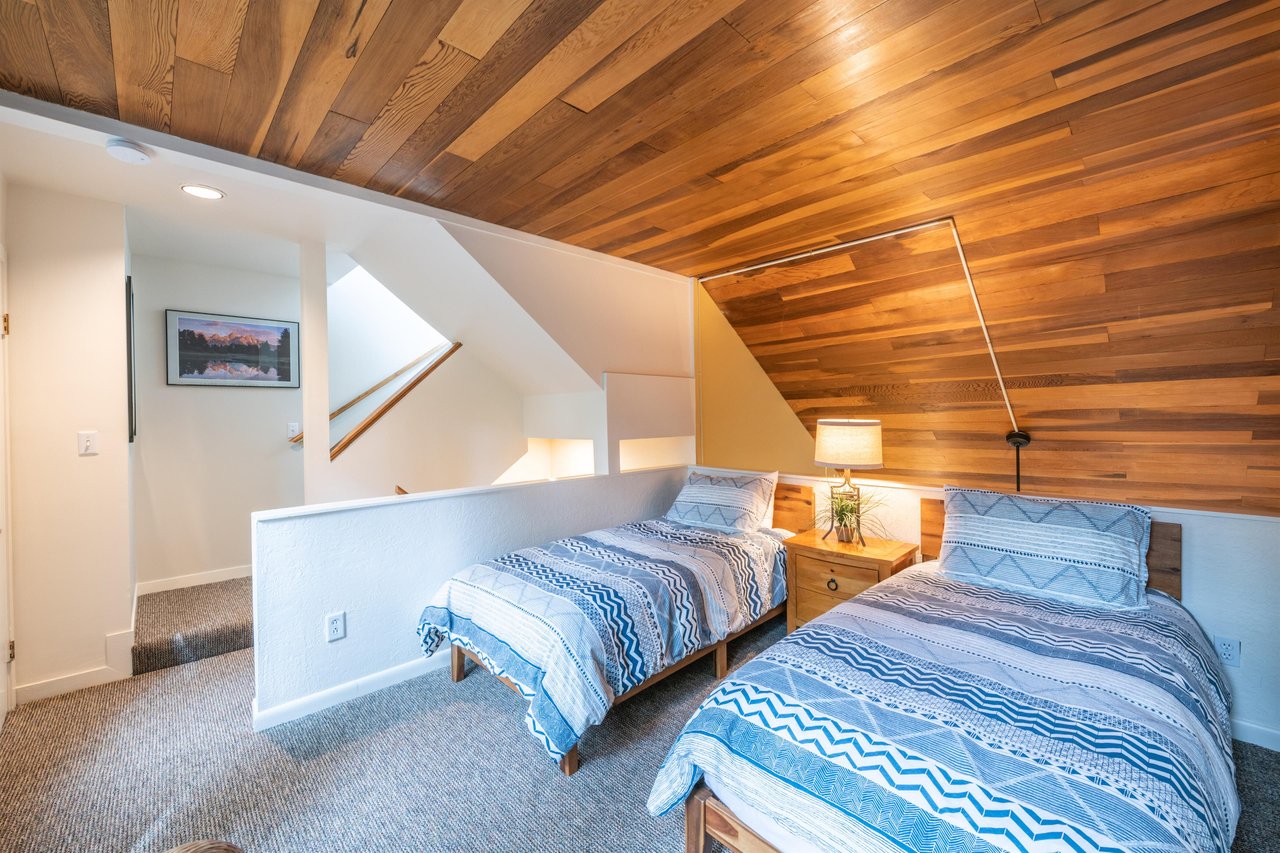 Sleep under the warmth of beautiful vaulted wood ceilings in this unique loft bedroom at Pay Day 183. With plenty of space for the kids or extra guests, this Park City vacation rental truly has room f
