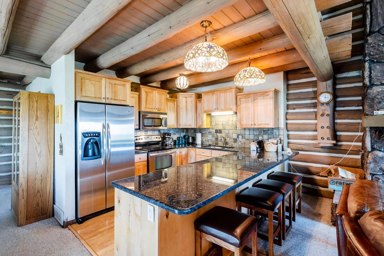 From the granite island to the stainless steel appliances, the beautifully appointed kitchen at Temptation 8 has everything you need for a comfortable stay at this toprated Park City condo rental whe