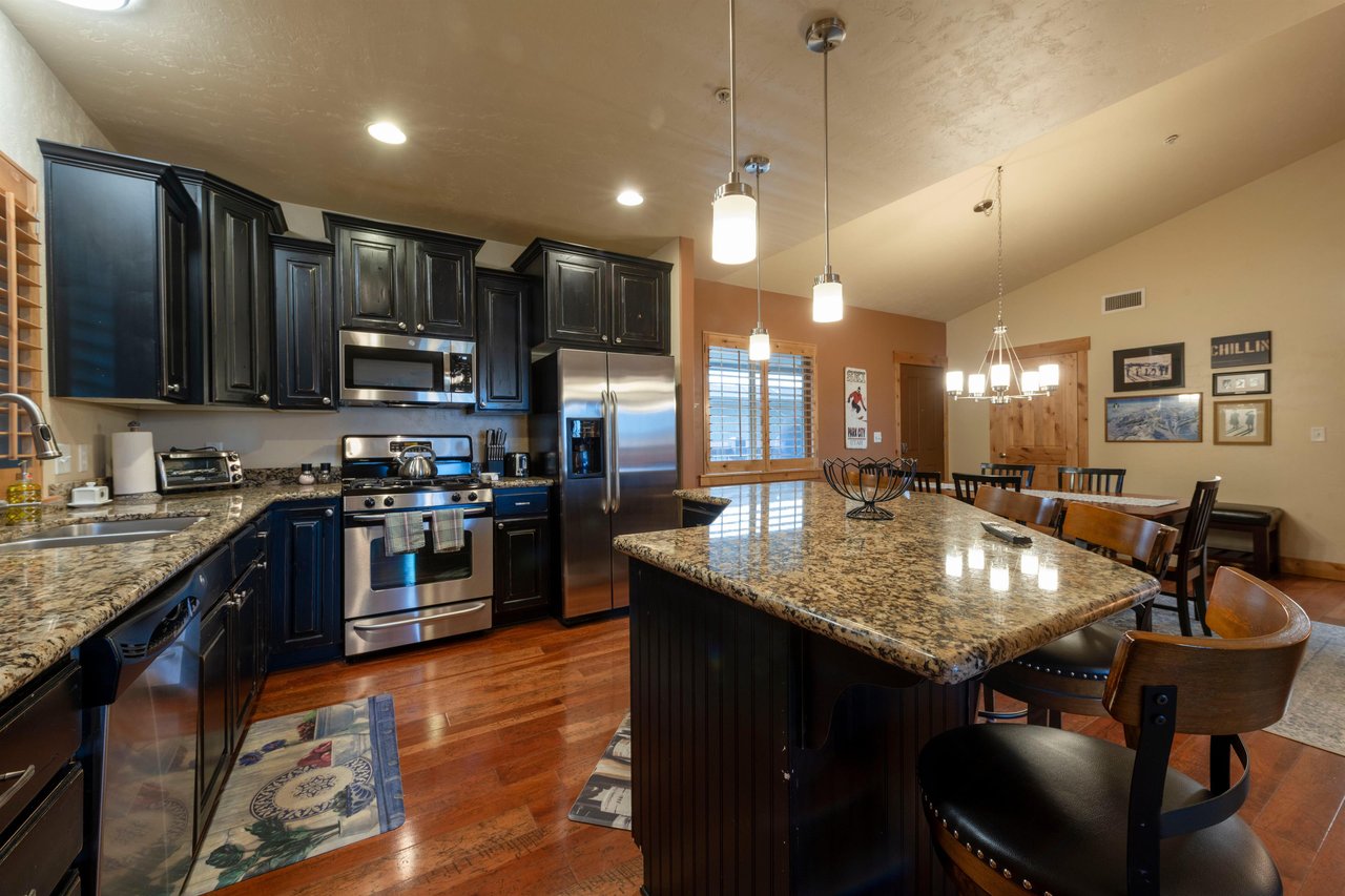 Bear Hollow 4402 features a fully equipped kitchen with stainless steel appliances, granite countertops, and ample space for cooking and entertaining — a standout feature of this Park City vacation re