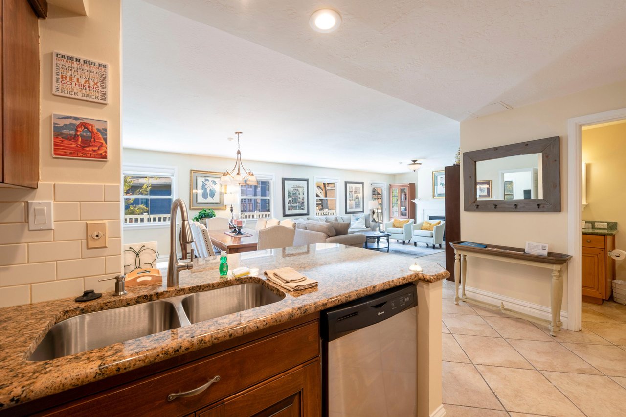 Stay connected with the group from the kitchen at Resort Plaza 5004 — this airy Park City condo rental features a seamless open layout, granite counters, and plenty of natural light for a relaxed and