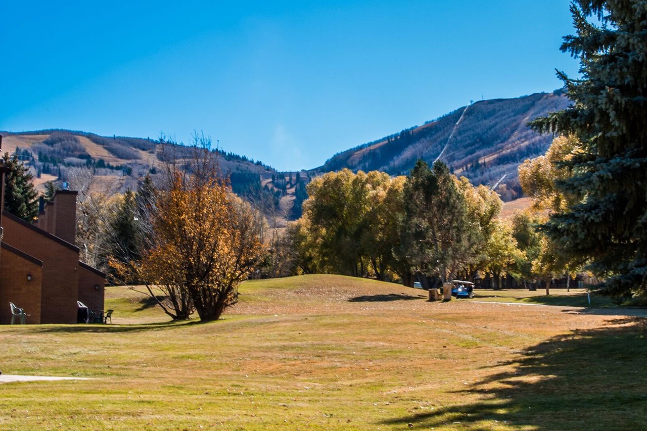 Breathtaking mountain views, golden autumn foliage, and wide open fairways — welcome to the backyard of your Park City vacation rental at Park Avenue 236.