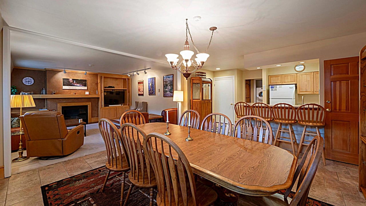 Resort Plaza 5013 offers a grand dining area perfect for group gatherings — an ideal Park City vacation rental for families and friends enjoying the ultimate mountain escape.