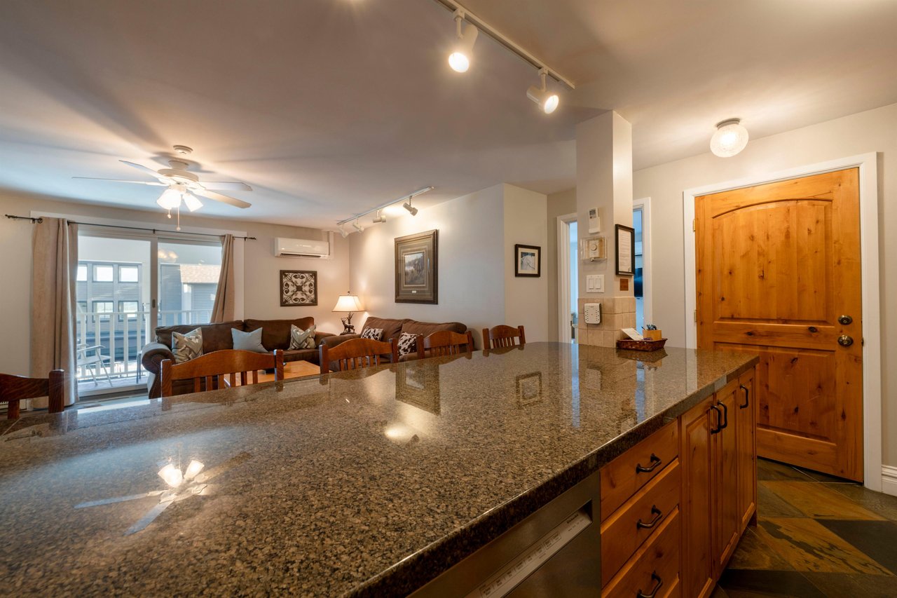 Enjoy the spacious open floor plan at Resort Plaza 5022 — a welldesigned Park City condo rental that makes gathering together easy during your Park City lodging stay.