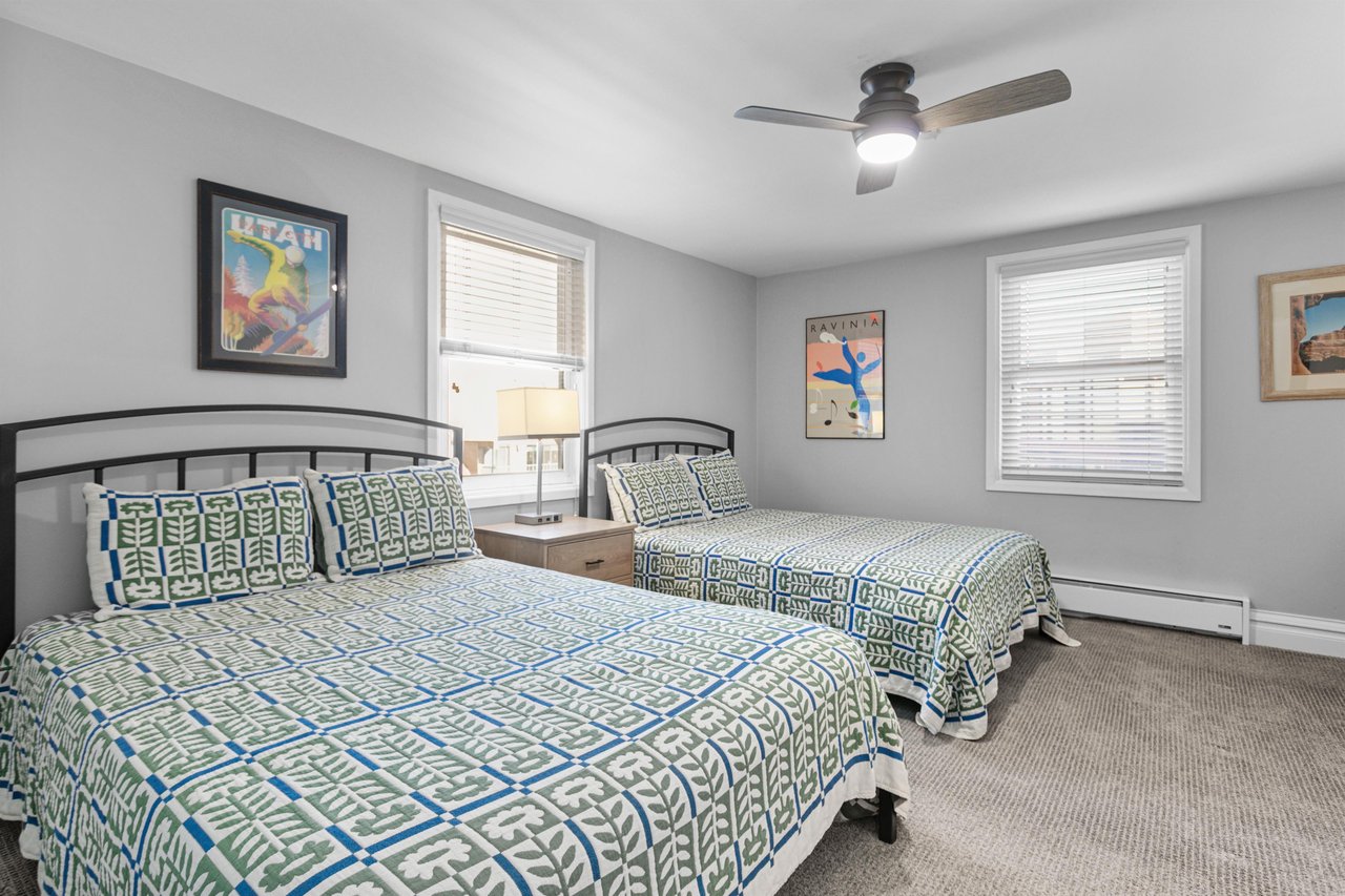 Bright, airy, and comfortably appointed, this double queen bedroom is flooded with natural light and fun décor, making it a great space for kids or guests. A top pick for Park City lodging for the who