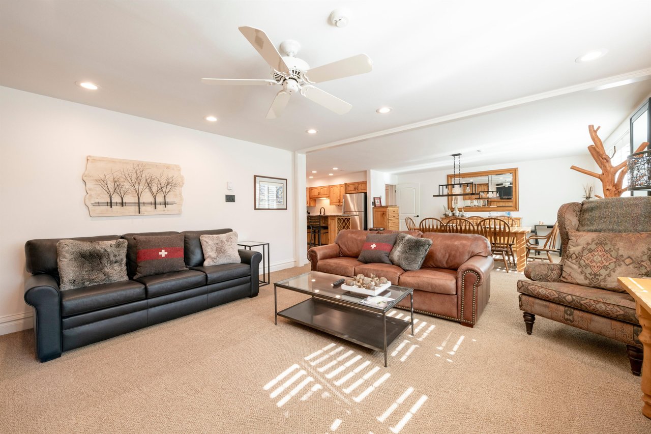 Bright, spacious, and comfortably furnished, this expansive living area is the heart of Resort Plaza 5034, making it an ideal Park City lodging choice for families and groups who love to gather togeth