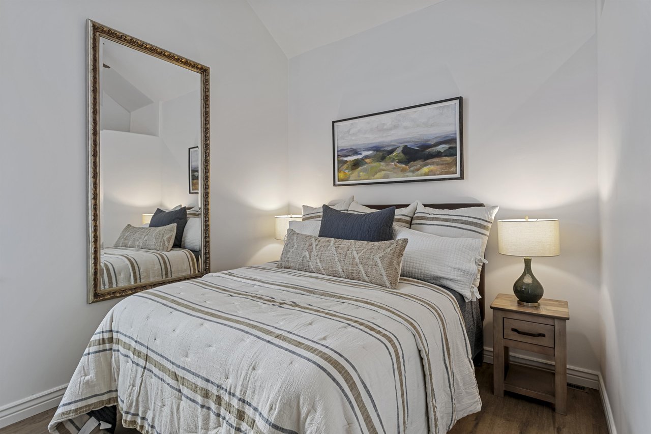 Drift into peaceful sleep in your cozy bedroom, thoughtfully styled with soft linens, warm lighting, and serene décor that invites you to unwind completely.