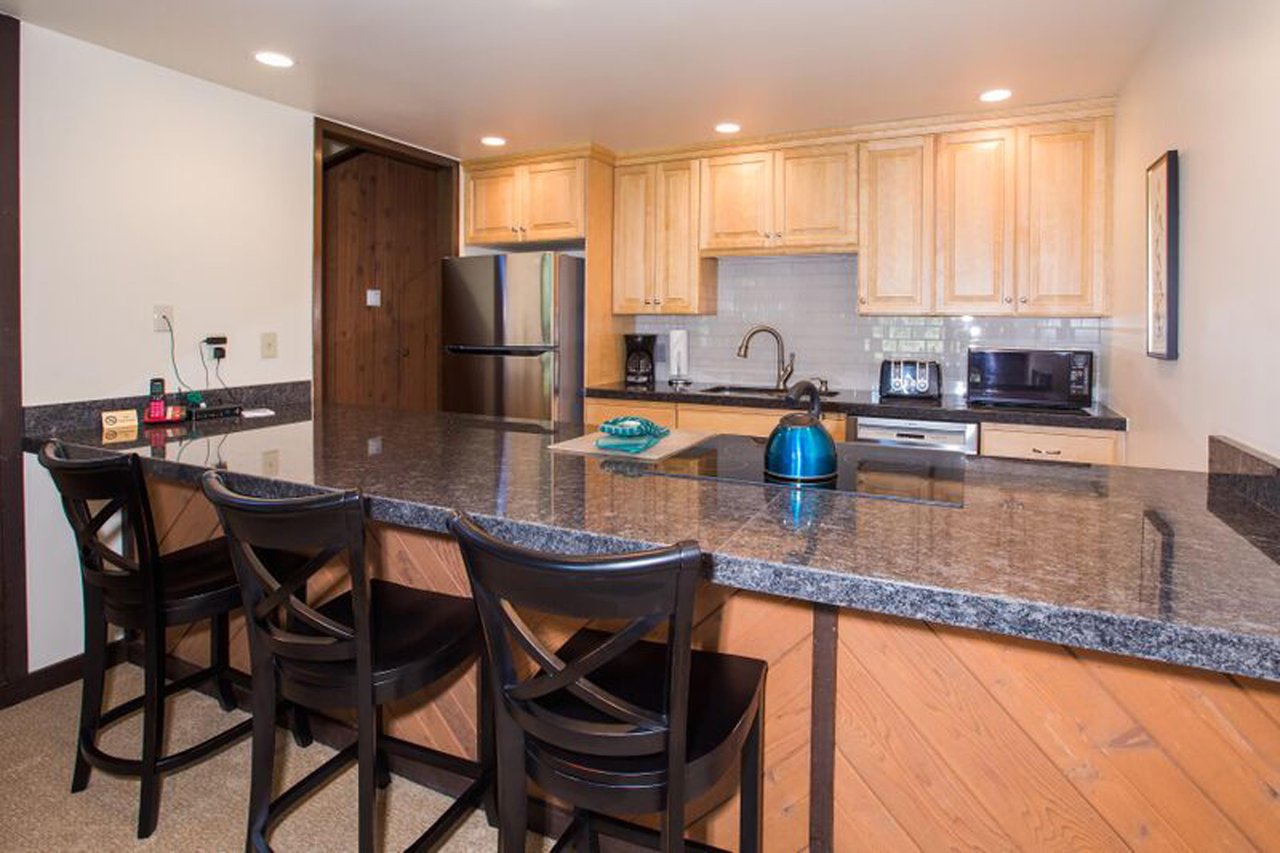 Cook, gather, and entertain with ease at the impressive kitchen and breakfast bar at Three Kings 37, where quality finishes and modern appliances make every meal a pleasure in this outstanding Park Ci