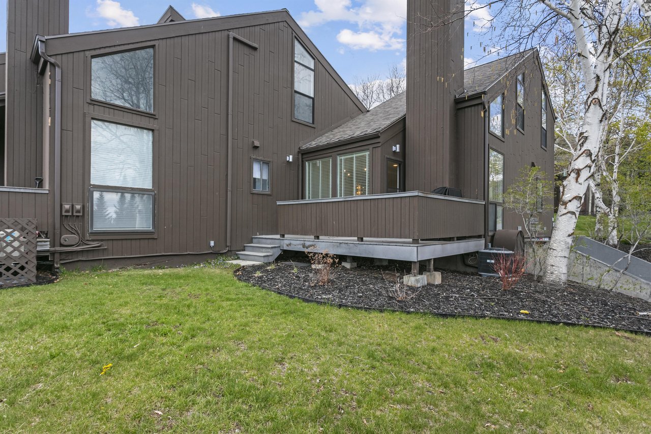 Three Kings 83s exterior reflects the classic Park City aesthetic — dark vertical siding, mature trees, and a private back deck for outdoor enjoyment.