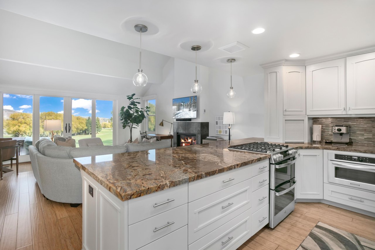 Three Kings 64 sets itself apart with a beautifully renovated kitchen boasting a large center island, elegant pendant lighting, and topoftheline appliances that elevate this Park City condo rental